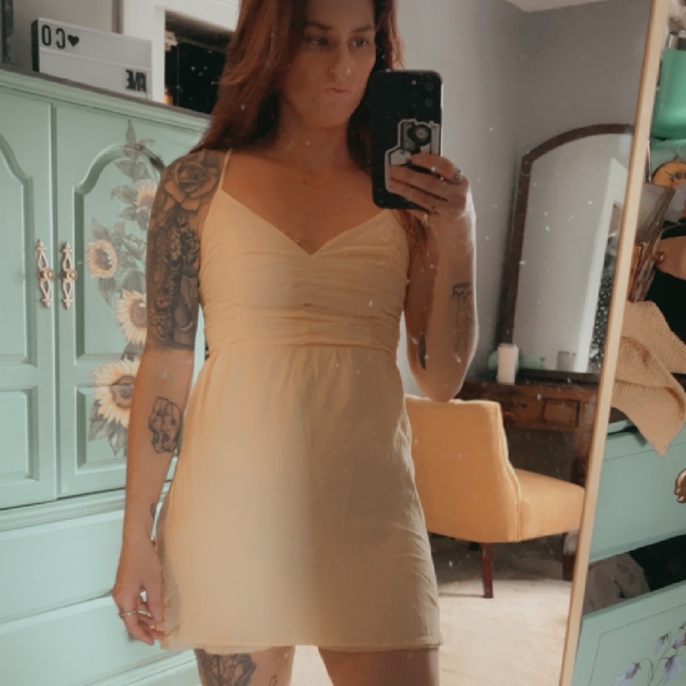 Pale yellow corset mini dress